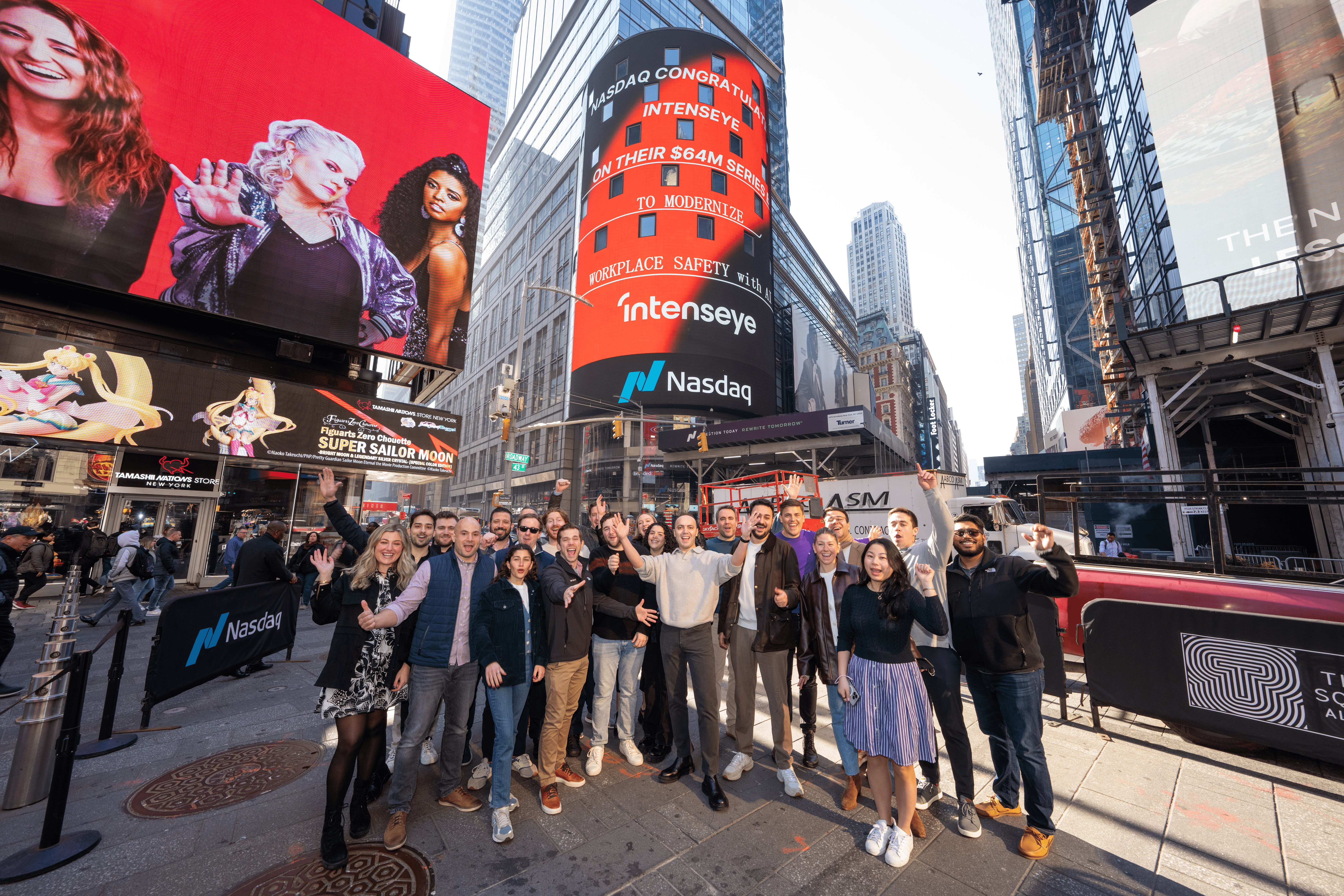 The Intenseye team in Times Square in front of the Nasdaq tower